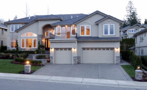 A large luxury house with a three-car garage