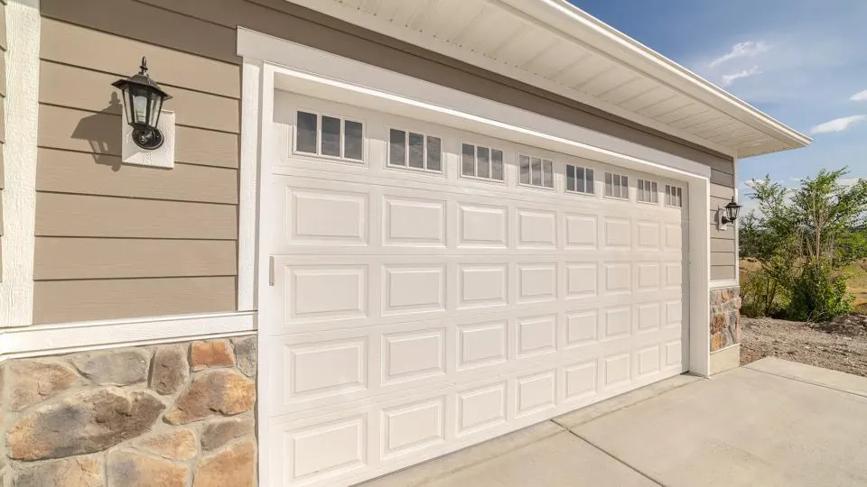 Illustration of a well-maintained garage door, showcasing solutions to common problems provided by BT1 Garage Door Company for homeowners in Gallatin, Hendersonville, and Nashville, Tennessee.